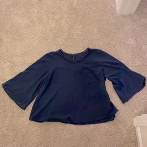 Accent trim navy blouse